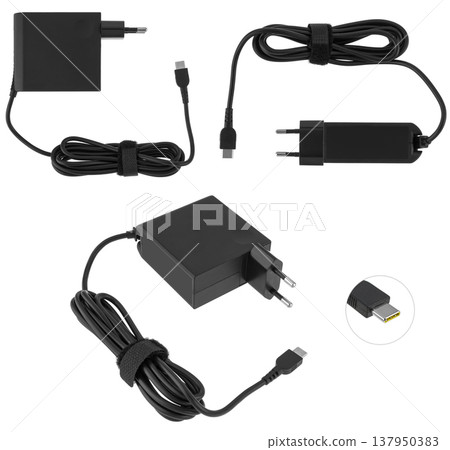 power adapter for a laptop, a spare part for a computer, on a white background power adapter for a laptop, a spare part for a computer, on a white background 137950383