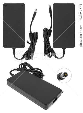 power adapter for a laptop, a spare part for a computer, on a white background 137950384