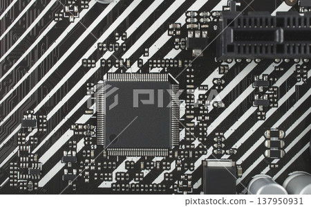 Part of a printed circuit board, close-up, a spare part from a computer Part of a printed circuit board, close-up, a spare part from a computer 137950931