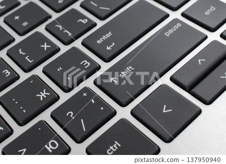 Part of the keyboard from a computer, laptop, close-up 137950940