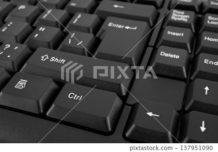 Part of a computer keyboard, black close-up Part of a computer keyboard, black close-up 137951090