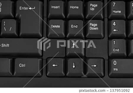 Part of a computer keyboard, black close-up 137951092