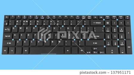 laptop keyboard, on a blue background laptop keyboard, on a blue background 137951171