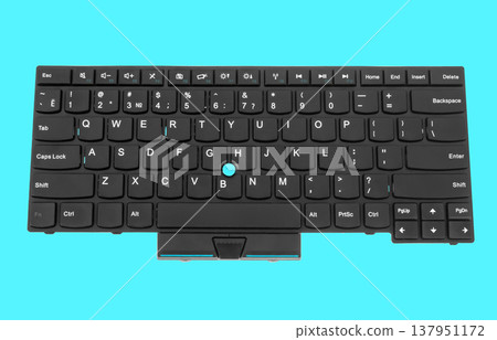 laptop keyboard, on a blue background laptop keyboard, on a blue background 137951172