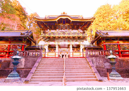 Nikko City, Nikko Toshogu Shrine, Yomeimon Gate shining in the setting sun 137951663