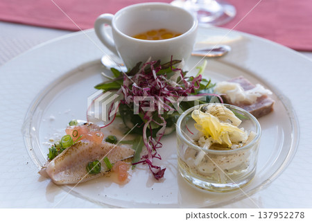 A three-piece seasonal appetizer platter served at a French restaurant in Sakata City (early March, local ingredients) A three-piece seasonal appetizer platter served at a French restaurant in Sakata City (early March, local ingredients) 137952278
