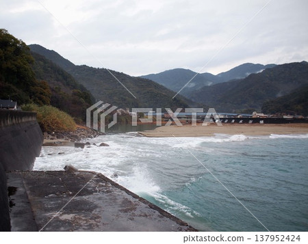 A sandy beach in the morning after the rain. 137952424