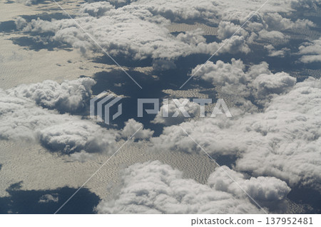 Clouds viewed from above: A view of the sky. 137952481