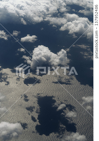 Clouds viewed from above: A view of the sky. Clouds viewed from above: A view of the sky. 137952486