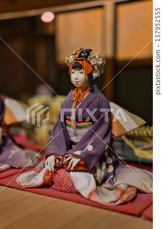 A doll in a gorgeous Japanese outfit and a tranquil Japanese-style room (Japanese traditional culture) A doll in a gorgeous Japanese outfit and a tranquil Japanese-style room (Japanese traditional culture) 137952555