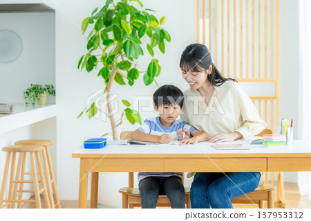 Children studying in the living room 137953312