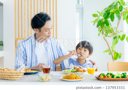 Young family, meal, dining table Young family, meal, dining table 137953331