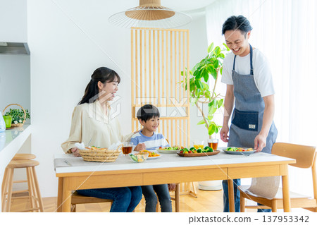 Young family, meal, dining table 137953342