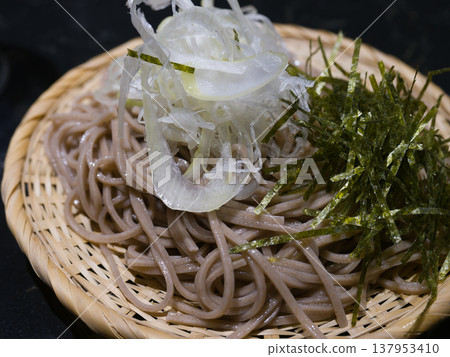 Small portion of Zaru Soba (served with shredded nori seaweed and white onions for a refreshing taste) 137953410