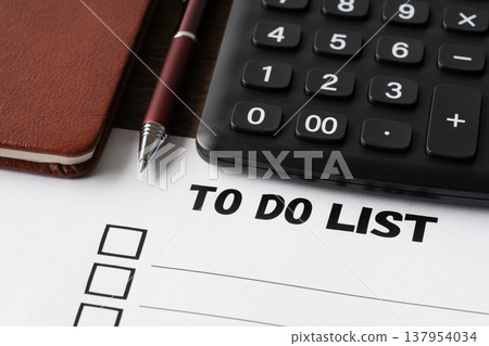 To-do list, calculator, notebook, and ballpoint pen To-do list, calculator, notebook, and ballpoint pen 137954034