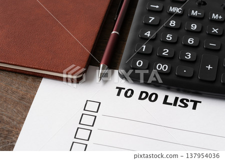 To-do list, calculator, notebook, and ballpoint pen To-do list, calculator, notebook, and ballpoint pen 137954036
