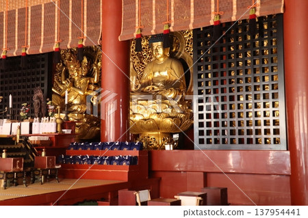 Buddhist statues in the Sanbutsudo Hall of Nikko Rinnoji Temple Buddhist statues in the Sanbutsudo Hall of Nikko Rinnoji Temple 137954441