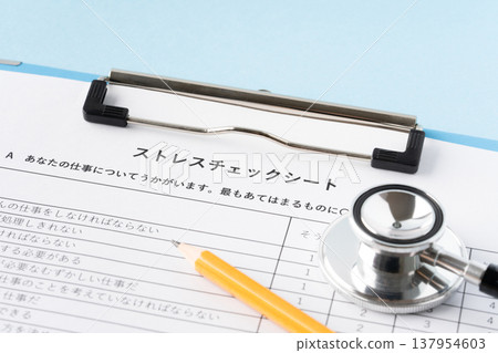 Close-up of a stress check sheet, stethoscope, and pencil Close-up of a stress check sheet, stethoscope, and pencil 137954603