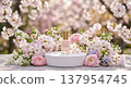 Product display stand surrounded by cherry blossoms and other spring flowers 137954745