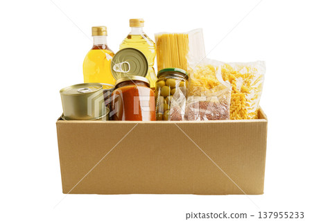 Foodstuffs in donation box for volunteer to help people. Foodstuffs in donation box for volunteer to help people. 137955233