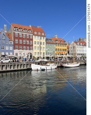 Nyhavn, Copenhagen, Denmark: A row of colorful buildings 137955474