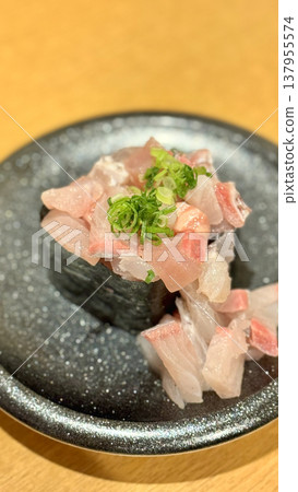 Gunkan sushi topped with fresh ingredients Gunkan sushi topped with fresh ingredients 137955574