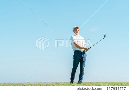 A male golfer playing golf on a golf course (shot golf competition) A male golfer playing golf on a golf course (shot golf competition) 137955757