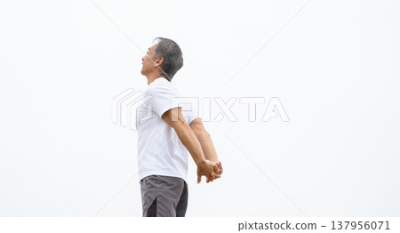 A man stretching A man stretching 137956071