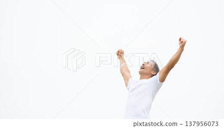 Man pumping his fist in victory Man pumping his fist in victory 137956073