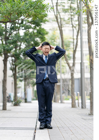 Young male business panic Young male business panic 137956147