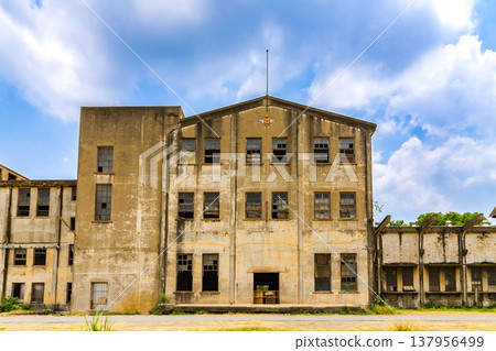 Old factory building, Old paper mill used to produce paper and banknotes during World War II point of interest in Kanchanaburi, Thailand 137956499