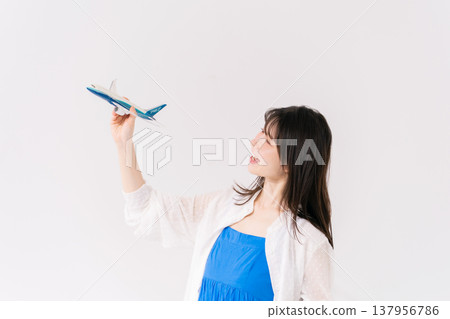 woman travel airplane woman travel airplane 137956786