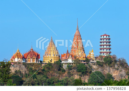 Landscape of Wat Tham Suea (Tiger Cave Temple) on the hill in Kanchanaburi, Thailand. 137956828