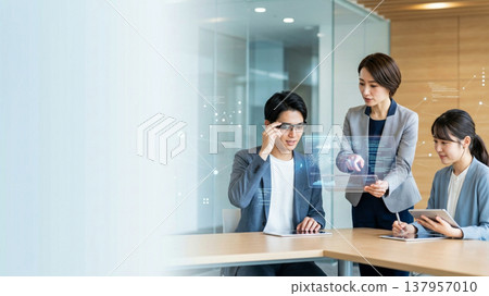 Business team holds meeting using smart glasses and holograms 137957010