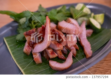 Grilled Pork Neck served on plate 137957294