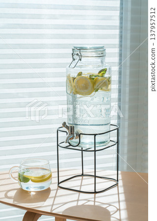 Lemon water jug on the table 137957512