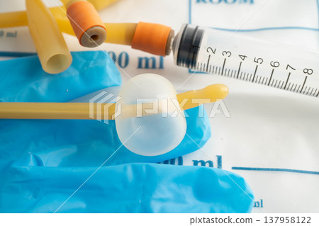 Foley catheter and urine drainage bag collect urine for disability or patient in hospital. Foley catheter and urine drainage bag collect urine for disability or patient in hospital. 137958122