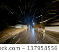 A road on a snowy night 137958556
