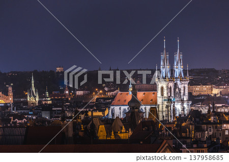 Night skyline of Prague with illuminated Church of Our Lady before Tyn and historic Old Town rooftops, Czech Republic Night skyline of Prague with illuminated Church of Our Lady before Tyn and historic Old Town rooftops, Czech Republic 137958685