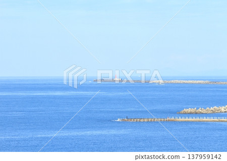 A beautiful view of Niigata Port under a clear blue sky. A beautiful view of Niigata Port under a clear blue sky. 137959142