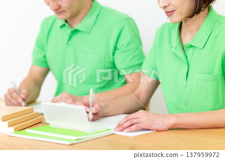 Care workers who study or do desk work 137959972