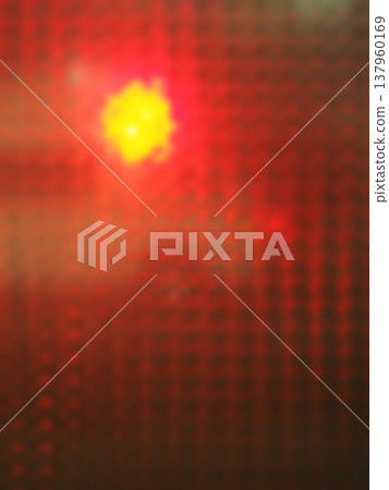 The red flashing lights of an ambulance seen through the glass. 137960169