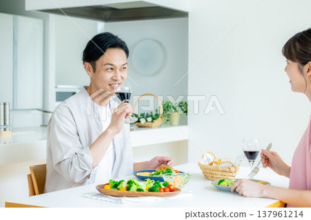 Couples drinking at home Couples drinking at home 137961214