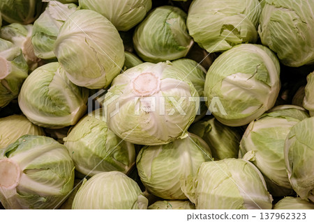 Fresh green cabbage heads at farmers market Fresh green cabbage heads at farmers market 137962323