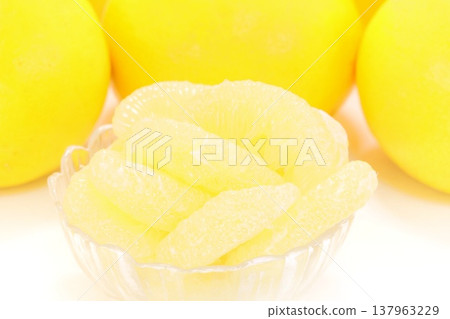 Tosa Buntan (pomelo), peeled, from Kochi Prefecture, bright background, dessert. Tosa Buntan (pomelo), peeled, from Kochi Prefecture, bright background, dessert. 137963229