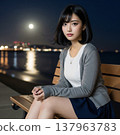 A woman looking at the night view 137963783