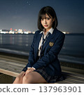 Taking a photo with a high school girl against a night view backdrop. 137963901