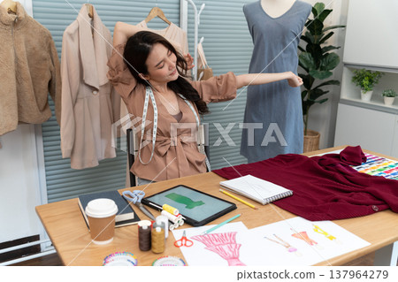 designer is feeling tired and exhausted from working on a lazily designer is feeling tired and exhausted from working on a lazily 137964279