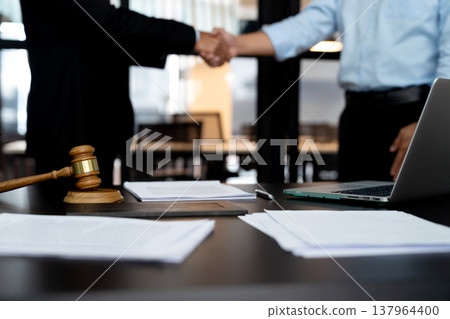 businessman lawyer standing handshake congratulating agreement 137964400