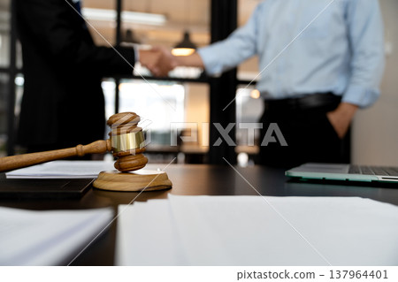 businessman lawyer standing handshake congratulating agreement 137964401